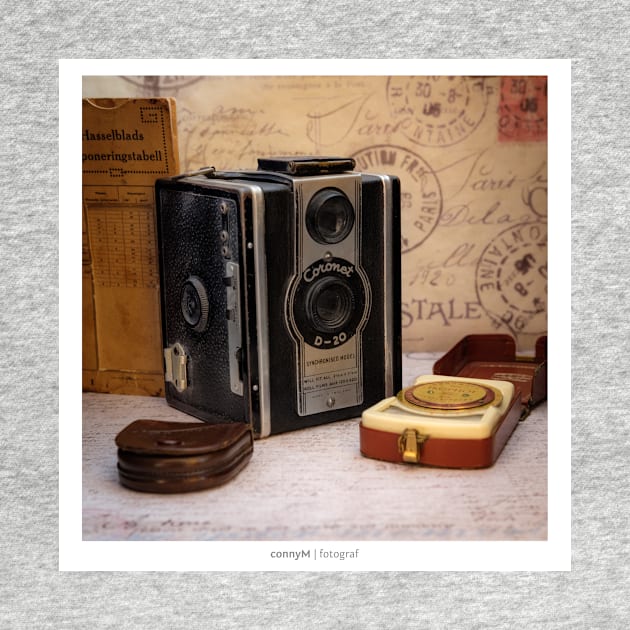 An old vintage camera with external exposure meter, as a poster by connyM-Sweden